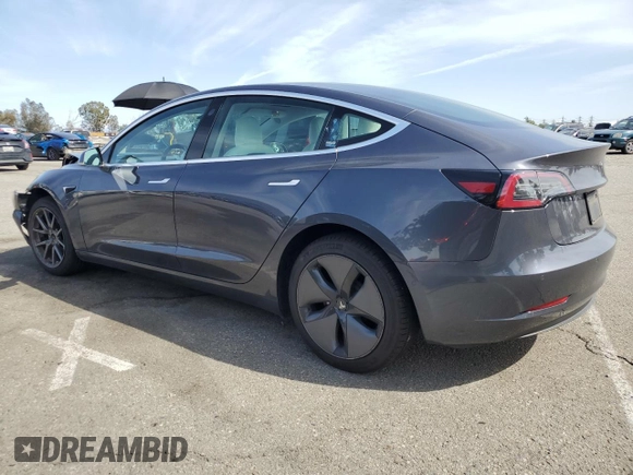 2019 Tesla Model 3 Mid Range with VIN 5YJ3E1EA0KF445185, listed as a Copart auction lot 48630675 with 76,351 mi miles and Salvage Title. Bid and sale history available at carsss.com. Image 2.