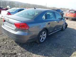 2013 Volkswagen Passat SE with VIN 1VWBP7A36DC039148, listed as a IAAI auction lot 42075823 with 196,734 mi miles. Bid and sale history available at carsss.com. Image 4.