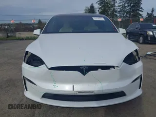 2022 Tesla Model X with VIN 7SAXCBE54NF363113, listed as a IAAI auction lot 41978397 with 27,166 mi miles. Bid and sale history available at carsss.com. Image 13.