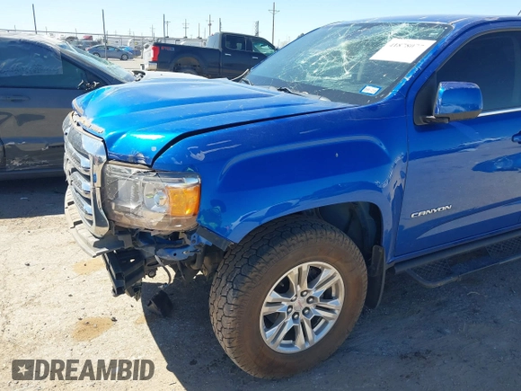 2019 GMC Canyon 4WD SLE z VIN 1GTG6CENXK1222416, wystawiony jako IAAI lot #41878077 z przebiegiem 85 415 mil mil oraz . Historia ofert i sprzedaży dostępna na DreamBid. Obrazek 6.