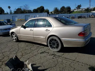 2001 Mercedes-Benz E-Class with VIN WDBJF70J91B263080, listed as a Copart auction lot 88094325 with 193,366 mi miles and Salvage Title. Bid and sale history available at carsss.com. Image 2.
