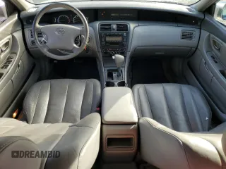 2002 Toyota Avalon XL with VIN 4T1BF28B32U263941, listed as a Copart auction lot 83993504 with 118,438 mi miles and Salvage Title. Bid and sale history available at DreamBid. Image 8.
