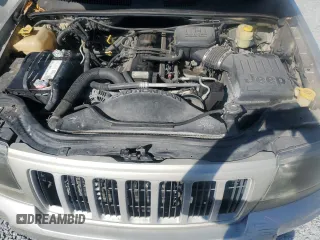 2004 Jeep Grand Cherokee with VIN 1J8GX48S84C329291, listed as a Copart auction lot 43295185 with 234,680 mi miles and Salvage title. Bid and sale history available at DreamBid. Image 12.
