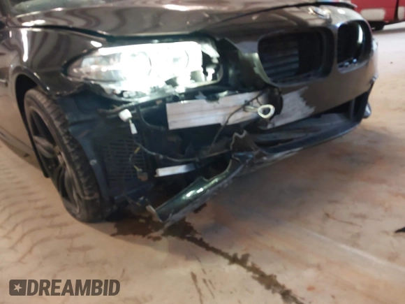 2014 BMW 5 Series 535i with VIN WBA5B1C57ED480208, listed as a IAAI auction lot 41257404 with 114,340 mi miles and . Bid and sale history available at DreamBid. Image 12.