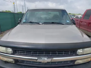1999 Chevrolet Silverado 1500 LS with VIN 2GCEK19T4X1219464, listed as a IAAI auction lot 42131667 with 198,192 mi miles. Bid and sale history available at carsss.com. Image 10.