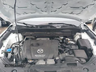 2017 Mazda CX-5 Touring z VIN JM3KFBCL5H0128584, wystawiony jako IAAI lot #42354669 z przebiegiem 56 563 mil mil oraz . Historia ofert i sprzedaży dostępna na DreamBid. Obrazek 10.