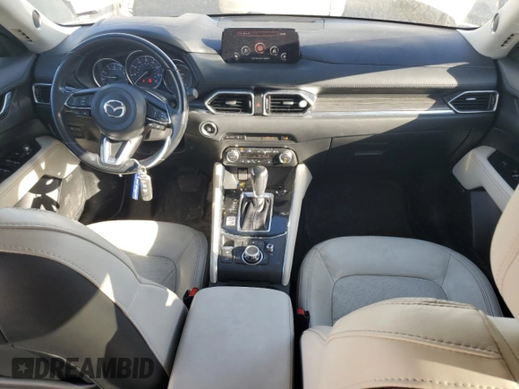 2018 Mazda CX-5 Grand Touring with VIN JM3KFADM3J1410210, listed as a Copart auction lot 44031365 with 69,016 mi miles and Clean Title. Bid and sale history available at DreamBid. Image 8.