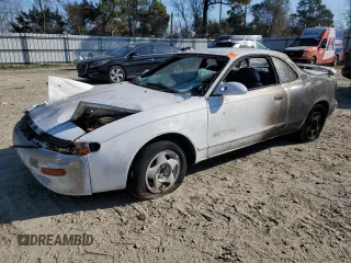 1990 Toyota Celica z VIN JT2ST87F1L0055241, wystawiony jako Copart lot #48851765 z przebiegiem 213 665 mil mil oraz Nie do naprawy. Historia ofert i sprzedaży dostępna na DreamBid. Obrazek 1.