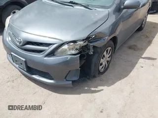2011 Toyota Corolla L with VIN 2T1BU4EEXBC559590, listed as a IAAI auction lot 42101256 with 163,307 mi miles and . Bid and sale history available at DreamBid. Image 6.