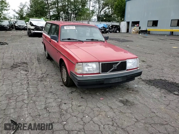 1993 Volvo 240 with VIN YV1AW8801P1942014, listed as a Copart auction lot 69491174 with 145,809 mi miles and Salvage title. Bid and sale history available at DreamBid. Image 11.