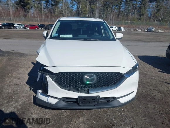 2019 Mazda CX-5 Grand Touring with VIN JM3KFBDM2K0672720, listed as a IAAI auction lot 41751196 with 51,632 mi miles and . Bid and sale history available at carsss.com. Image 12.