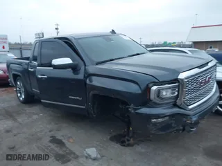 2018 GMC Sierra 1500 Denali with VIN 3GTU2PEJ8JG571593, listed as a IAAI auction lot 41169420 with 98,501 mi miles. Bid and sale history available at carsss.com. Image 1.
