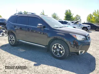 2017 Subaru Forester Touring z VIN JF2SJGWCXHH805812, wystawiony jako Copart lot #61081795 z przebiegiem 99 017 mil mil oraz Szkoda całkowita • Salvage title. Historia ofert i sprzedaży dostępna na DreamBid. Obrazek 4.