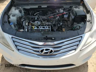 2013 Hyundai Azera z VIN KMHFH4JG4DA214345, wystawiony jako Copart lot #57491015 z przebiegiem 178 722 mil mil oraz Czysty tytuł • Clean title. Historia ofert i sprzedaży dostępna na DreamBid. Obrazek 12.