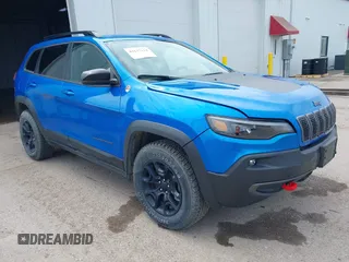 2022 Jeep Cherokee Trailhawk with VIN 1C4PJMBX4ND513488, listed as a IAAI auction lot 42137114 with 12,306 mi miles and . Bid and sale history available at DreamBid. Image 1.