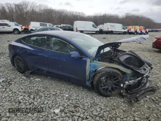 2024 Tesla Model 3 with VIN 5YJ3E1EAXRF829940, listed as a Copart auction lot 47689675 with 7,992 mi miles and Salvage Title. Bid and sale history available at carsss.com. Image 4.