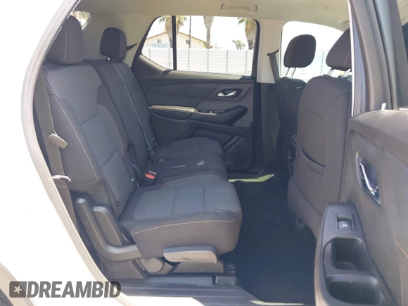 2021 Chevrolet Traverse LS z VIN 1GNERFKW8MJ266373, wystawiony jako IAAI lot #42170670 z przebiegiem 45 457 mil mil oraz . Historia ofert i sprzedaży dostępna na DreamBid. Obrazek 8.