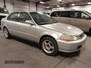 1996 Honda Civic EX with VIN 1HGEJ864XTL053613, listed as a IAAI auction lot 41717526 with 247,022 mi miles. Bid and sale history available at carsss.com. Image 1.