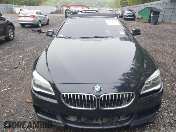 2017 BMW 6 Series 650i xDrive z VIN WBA6F7C52HD930816, wystawiony jako IAAI lot #42168478 z przebiegiem 89 191 mil mil oraz . Historia ofert i sprzedaży dostępna na DreamBid. Obrazek 12.
