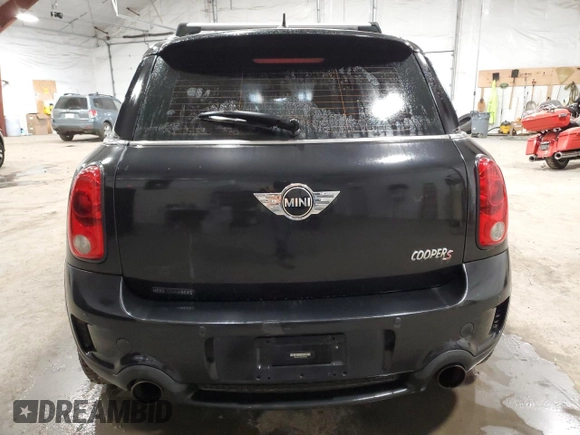 2013 MINI Countryman S ALL4 with VIN WMWZC5C55DWM15639, listed as a Copart auction lot 50991075 with 120,098 mi miles and Salvage Title. Bid and sale history available at DreamBid. Image 6.