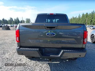 2018 Ford F-150 XL with VIN 1FTEW1E55JFC57989, listed as a IAAI auction lot 42395654 with 55,505 mi miles and . Bid and sale history available at DreamBid. Image 17.