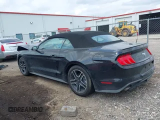 2021 Ford Mustang EcoBoost z VIN 1FATP8UH2M5120226, wystawiony jako IAAI lot #42164009 z przebiegiem 85 571 mil mil oraz . Historia ofert i sprzedaży dostępna na DreamBid. Obrazek 15.