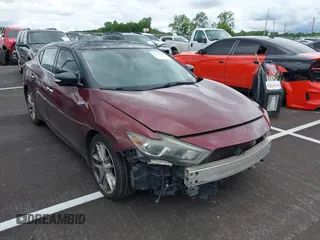 2016 Nissan Maxima S z VIN 1N4AA6AP3GC401332, wystawiony jako IAAI lot #42371607 z przebiegiem 177 464 mil mil oraz . Historia ofert i sprzedaży dostępna na DreamBid. Obrazek 1.