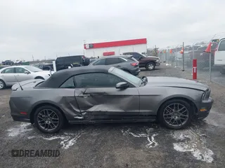 2014 Ford Mustang V6 with VIN 1ZVBP8EM1E5228353, listed as a IAAI auction lot 41525666 with 138,024 mi miles. Bid and sale history available at carsss.com. Image 13.