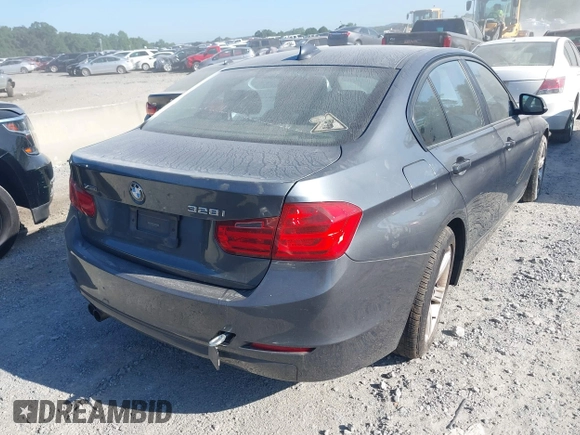 2014 BMW 3 Series 328i xDrive with VIN WBA3B5C59EP544228, listed as a IAAI auction lot 42738694 with 99,963 mi miles and . Bid and sale history available at DreamBid. Image 4.