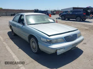 1996 Mercury Grand Marquis GS z VIN 2MELM74W3TX648820, wystawiony jako IAAI lot #42353201 z przebiegiem 125 063 mil mil oraz . Historia ofert i sprzedaży dostępna na DreamBid. Obrazek 6.