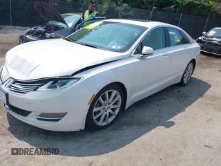 2015 Lincoln MKZ Hybrid with VIN 3LN6L2LU2FR600308, listed as a IAAI auction lot 42416417 with 120,670 mi miles and . Bid and sale history available at DreamBid. Image 2.