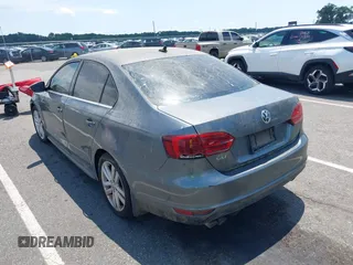 2014 Volkswagen Jetta GLI Autobahn with VIN 3VW5T7AJ6EM201416, listed as a IAAI auction lot 42684207 with 164,905 mi miles and . Bid and sale history available at DreamBid. Image 3.
