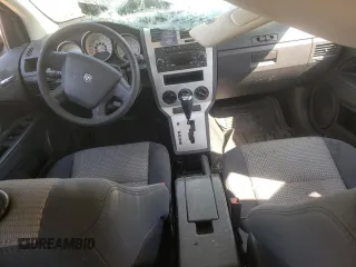 2009 Dodge Caliber SXT with VIN 1B3HB48A69D150199, listed as a Copart auction lot 51043165 with 218,125 mi miles and Clean Title. Bid and sale history available at DreamBid. Image 8.