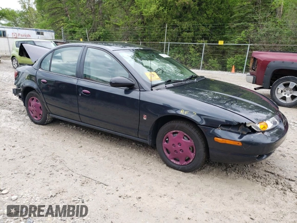 2002 Saturn SL z VIN 1G8ZH52842Z201392, wystawiony jako Copart lot #56595105 z przebiegiem Nie podano mil oraz Szkoda całkowita • Salvage title. Historia ofert i sprzedaży dostępna na DreamBid. Obrazek 4.