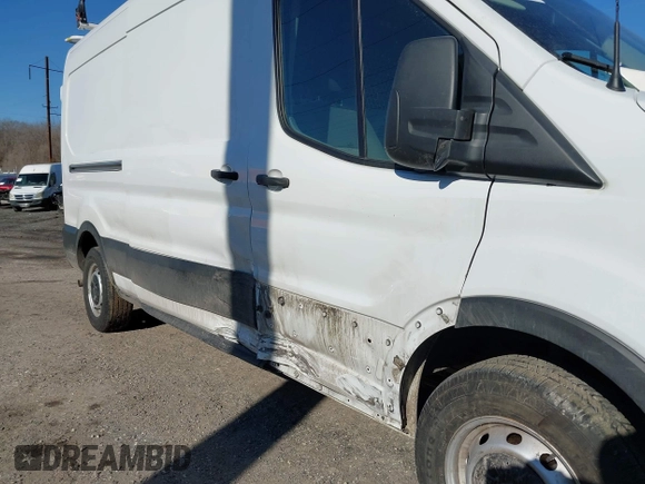 2021 Ford Transit Cargo with VIN 1FTBR1C80MKA48548, listed as a IAAI auction lot 41509103 with 87,523 mi miles and . Bid and sale history available at DreamBid. Image 6.