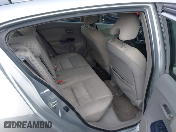 2010 Honda Insight EX with VIN JHMZE2H77AS022538, listed as a IAAI auction lot 41804579 with 184,000 mi miles and . Bid and sale history available at DreamBid. Image 8.