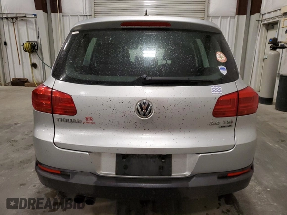 2013 Volkswagen Tiguan SE z VIN WVGBV3AX2DW559247, wystawiony jako Copart lot #57121375 z przebiegiem 171 171 mil mil oraz Czysty tytuł • Clean title. Historia ofert i sprzedaży dostępna na DreamBid. Obrazek 6.