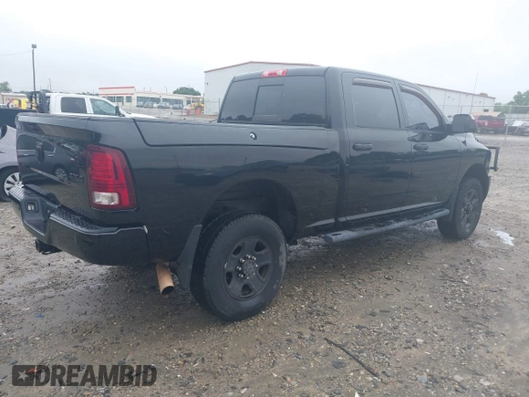 2014 Ram 2500 Big Horn with VIN 3C6UR5DJ8EG208290, listed as a IAAI auction lot 42336027 with 106,514 mi miles and . Bid and sale history available at DreamBid. Image 4.