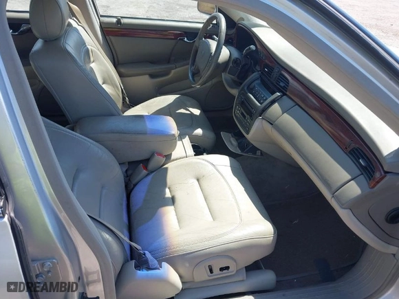 2001 Cadillac DeVille with VIN 1G6KD54Y91U235374, listed as a IAAI auction lot 41874980 with 136,090 mi miles. Bid and sale history available at carsss.com. Image 5.