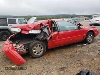 1996 Ford Thunderbird LX with VIN 1FALP62W8TH174603, listed as a Copart auction lot 72928574 with 153,614 mi miles and Salvage Title. Bid and sale history available at DreamBid. Image 3.