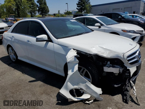 2014 Mercedes-Benz E 350 Sport with VIN WDDHF5KB8EA818290, listed as a Copart auction lot 62786005 with 128,327 mi miles and Salvage title. Bid and sale history available at DreamBid. Image 4.