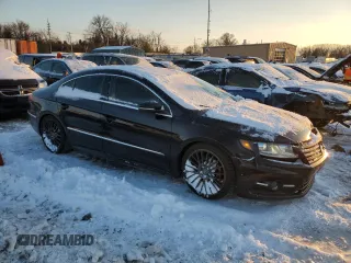 2014 Volkswagen CC Sport with VIN WVWBN7AN9EE505056, listed as a Copart auction lot 87305504 with 168,585 mi miles and Salvage Title. Bid and sale history available at carsss.com. Image 4.