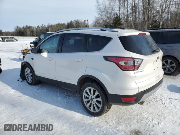 2017 Ford Escape Titanium with VIN 1FMCU9J9XHUA01661, listed as a Copart auction lot 88345395 with 79,865 mi miles and Salvage Title. Bid and sale history available at carsss.com. Image 2.