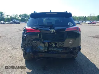 2016 Toyota RAV4 SE with VIN JTMJFREV2GJ089599, listed as a IAAI auction lot 42551300 with 90,352 mi miles and . Bid and sale history available at DreamBid. Image 17.