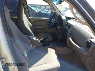 2004 Jeep Liberty Sport with VIN 1J4GK48K44W267418, listed as a IAAI auction lot 41591036 with 181,453 mi miles and . Bid and sale history available at DreamBid. Image 5.