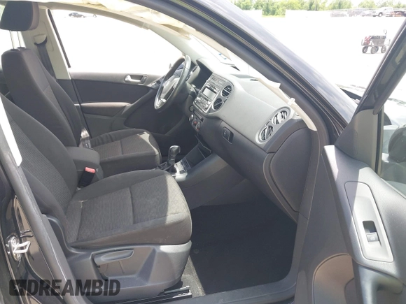 2014 Volkswagen Tiguan SE with VIN WVGAV3AX7EW549326, listed as a IAAI auction lot 42515906 with 102,221 mi miles and . Bid and sale history available at DreamBid. Image 5.
