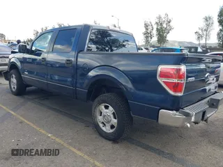 2013 Ford F-150 XL with VIN 1FTFW1CTXDFA92435, listed as a IAAI auction lot 41944748 with 147,016 mi miles. Bid and sale history available at carsss.com. Image 3.