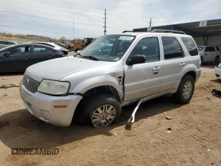 2007 Mercury Mariner Luxury with VIN 4M2YU91117KJ02032, listed as a Copart auction lot 50418815 with 128,498 mi miles and Salvage title. Bid and sale history available at DreamBid. Image 1.