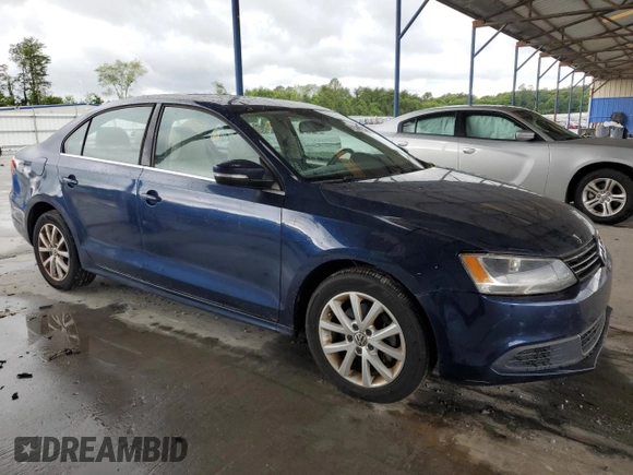 2013 Volkswagen Jetta SE with VIN 3VWDP7AJXDM379392, listed as a Copart auction lot 61598235 with 119,005 mi miles and Salvage title. Bid and sale history available at DreamBid. Image 4.