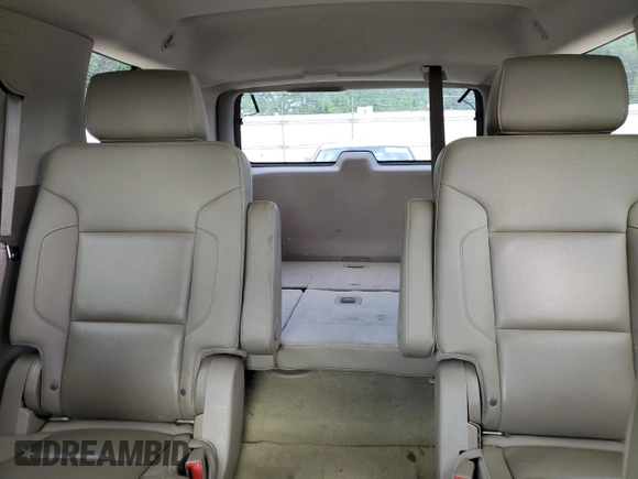 2016 Chevrolet Tahoe LTZ z VIN 1GNSKCKC4GR208861, wystawiony jako Copart lot #56832895 z przebiegiem 132 982 mil mil oraz Szkoda całkowita • Salvage title. Historia ofert i sprzedaży dostępna na DreamBid. Obrazek 11.